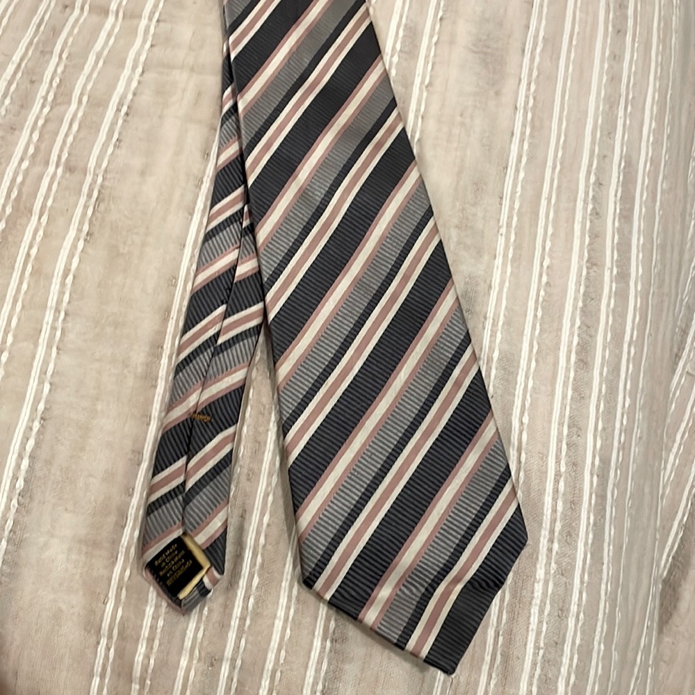 Donald J Trump signature collection tie. Dark and light grey with pink stripes.